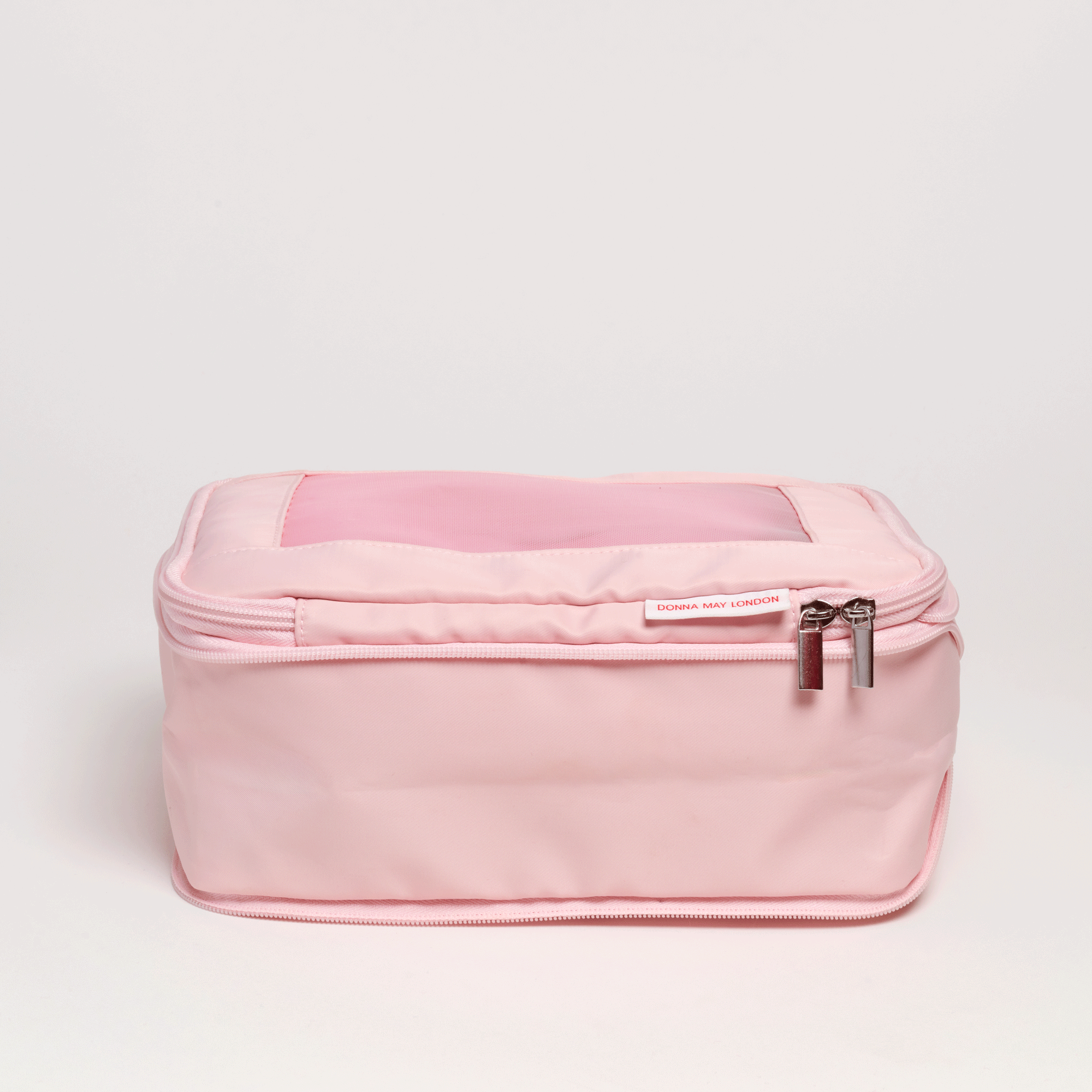 Compression Packing Cubes Set of 4 - pink with stripe interior.