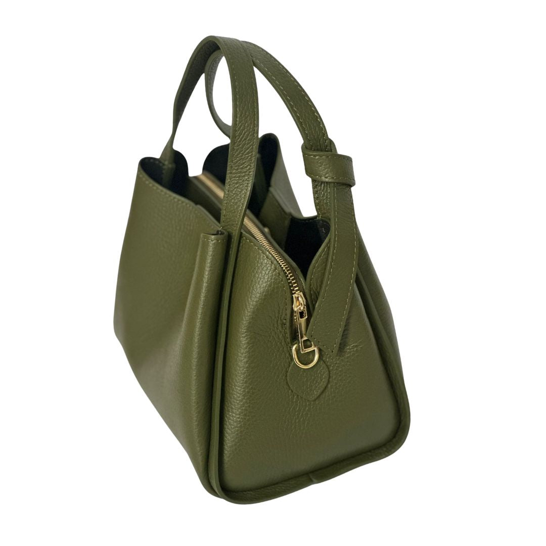 Green mini tote bag showing large zipped centre pocket and organised interior compartments