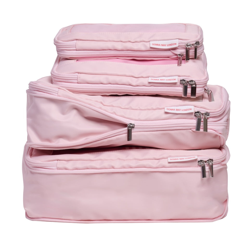 Compression Packing Cubes Set of 4 - pink with stripe interior.