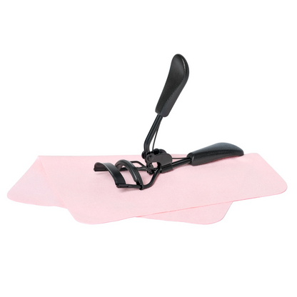 Donna May London sleek black eyelash curlers lifting lashes — ergonomic design for all eye shapes, no pinching or pulling.
