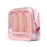 Set of three refillable silicone travel bottles with labels