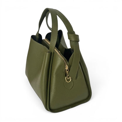 Green mini tote bag showing large zipped centre pocket and organised interior compartments