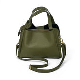 Olive green Bow Bag/ Donna May London. Mini tote bag with top handles and crossbody strap in pebbled finish