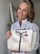 white leather makeup bag