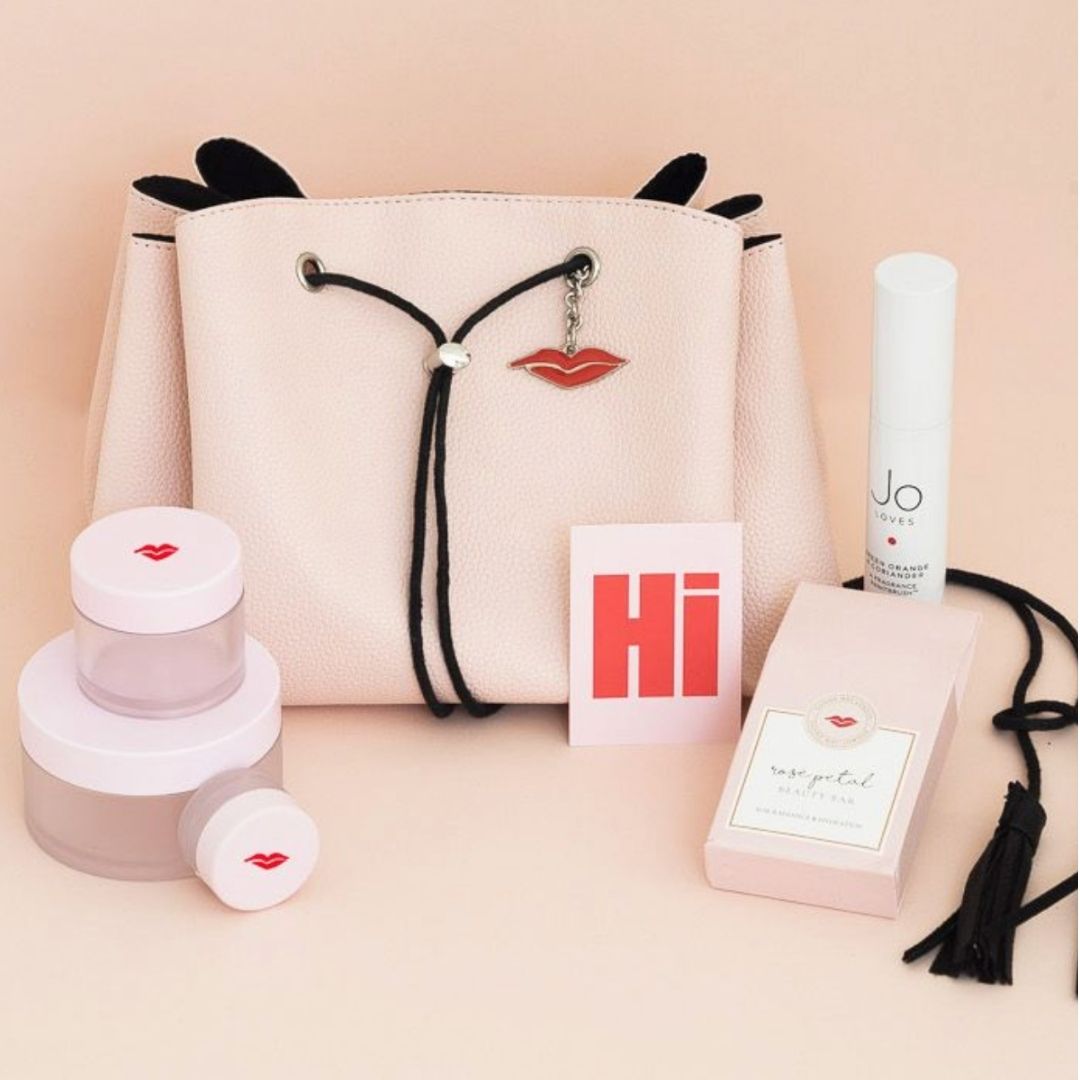 Pink flat lay makeup bag