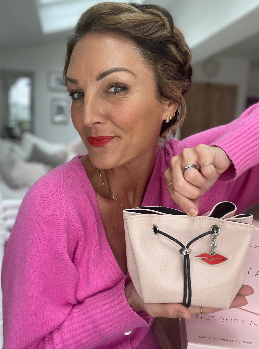 Makeup bag with red lip detail